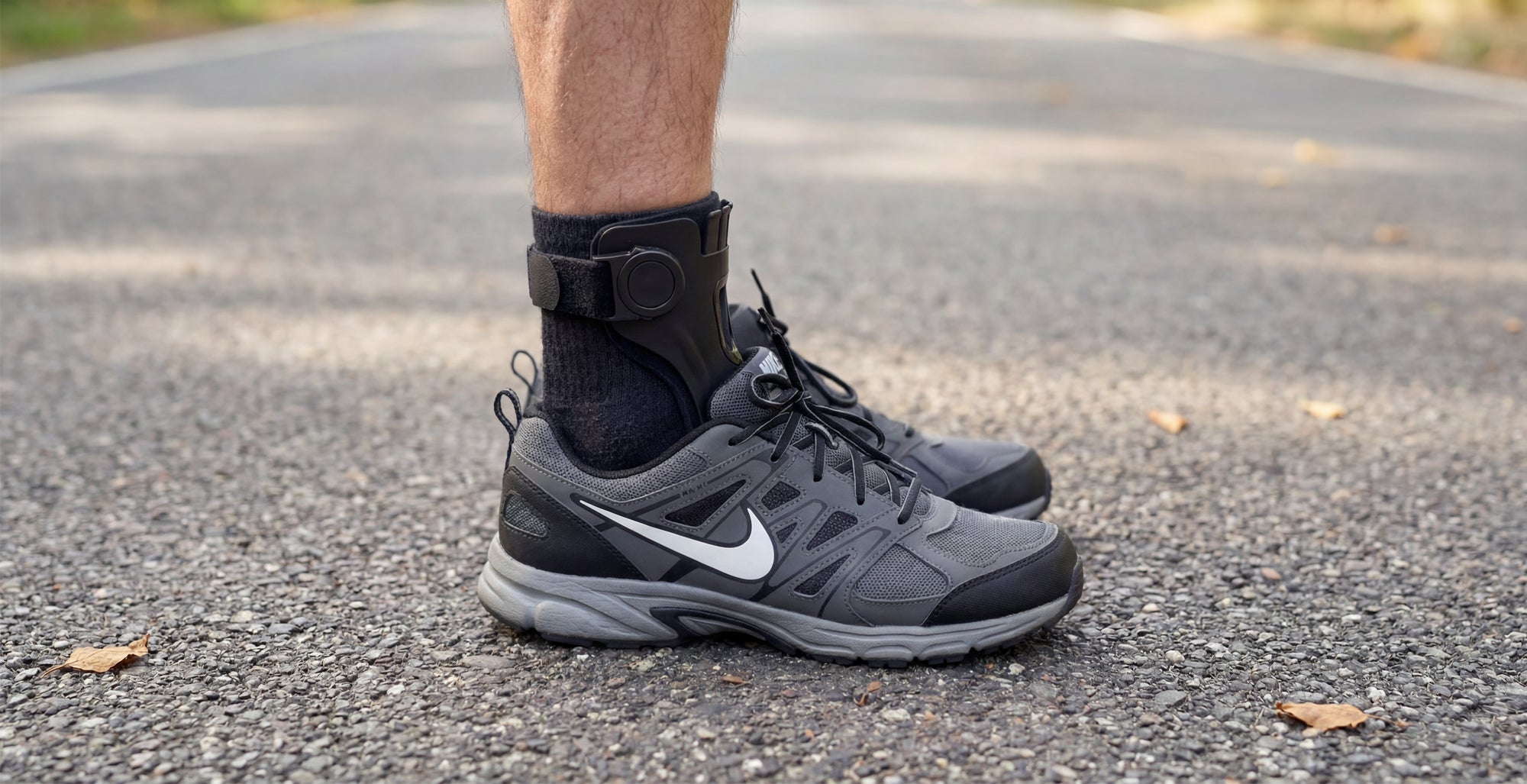 Walking outdoors wearing the Cedrow foot-drop brace